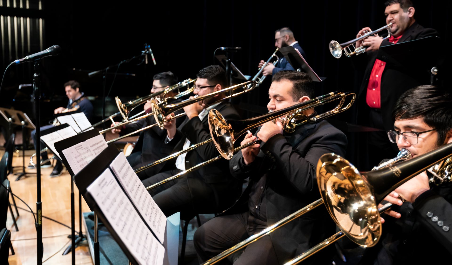 Music concert with students playing trumpets Music concert with students playing trumpets