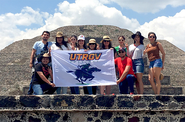 UTRGV students attending a summer study abroad communications class in Mexico City pause for a photo in front of the Basílica de Nuestra Señora de Guadalupe in the Zócalo, the city’s main square. The group includes (from left) Esai Torres, Luis Cavazos, Daliarlene Saenz, Vanessa Soto, Ninah Caquias, Lupita Strong, Adriana Gutierrez, Bianca Lopez, Osmara Garcia, Sarah Peña and Yvette Salinas. In the back row is Dr. William Strong, UTRGV communications professor who conducted the class, holding his daughter, Scarlett. (Courtesy Photo)