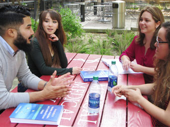 students at table having discussion