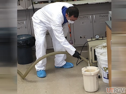EHSRM Personnel Using Mercury Vacuum to Clean Up Mercury Spill, February 27, 2019.