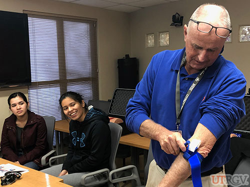 EHSRM Director practicing with tourniquet, Stop the Bleed Training, December 2018
