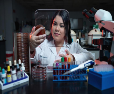 Scientist looking at blood sample
