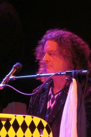 Dr John Blangero performing as the lead vocalist in Harlequin Reborn 