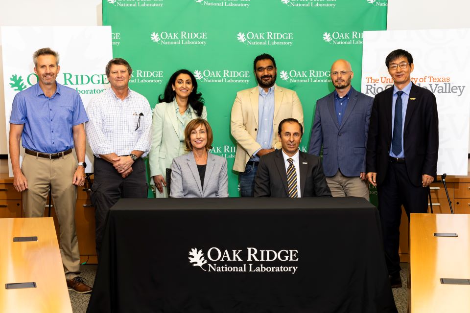 Front row, from left to right: Dr. Susan Hubbard, deputy for Science and Technology at ORNL, and Dr. Can (John) Saygin, senior vice president for Research at UTRGV and dean of the Graduate College. Second row, from left to right: Dr. Yarom Polsky, ORNL director of the Manufacturing Science Division (MSD); Dr. Richard "Rick" Raines, ORNL interim associate laboratory director, Energy Science and Technology Directorate (ESTD); Moody E. Altamimi, founding director for the Office of Research Education (ORE) at ORNL; Dr. Ahmed Arabi Hassen, ORNL group leader and senior R&D staff scientist; Dr. Vlastimil Kunc, section head for Composites Science and Technology at ORNL; and Dr. Jianzhi (James) Li, UTRGV professor of Manufacturing Engineering and director of CA2REERs. (Photo courtesy by Oak Ridge National Laboratory, U.S. Dept. of Energy)