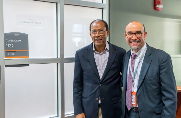 The UTRGV School of Podiatric Medicine recently received an anonymous donation of $250,000 in honor of Dr. Lawrence Harkless (left), the interim dean of the school from 2019 to 2022 and a central figure in developing the podiatry program at UTRGV. He is shown here with Dr. Javier La Fontaine, inaugural and current dean of the SOPM, at a recent event naming a classroom in Harkless’ honor. (UTRGV Photo by David Pike)