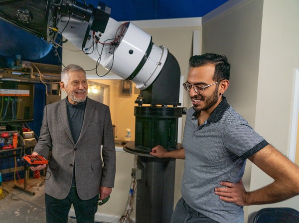 Shown in the photo are Dr. Mario Diaz, director of UTRGV’s Center for Gravitational Wave Astronomy and Moises Castillo, a part-time lecturer in the astronomy and general physics labs, at the UTRGV Observatory at Resaca de la Palma park. (UTRGV Photo by David Pike)
