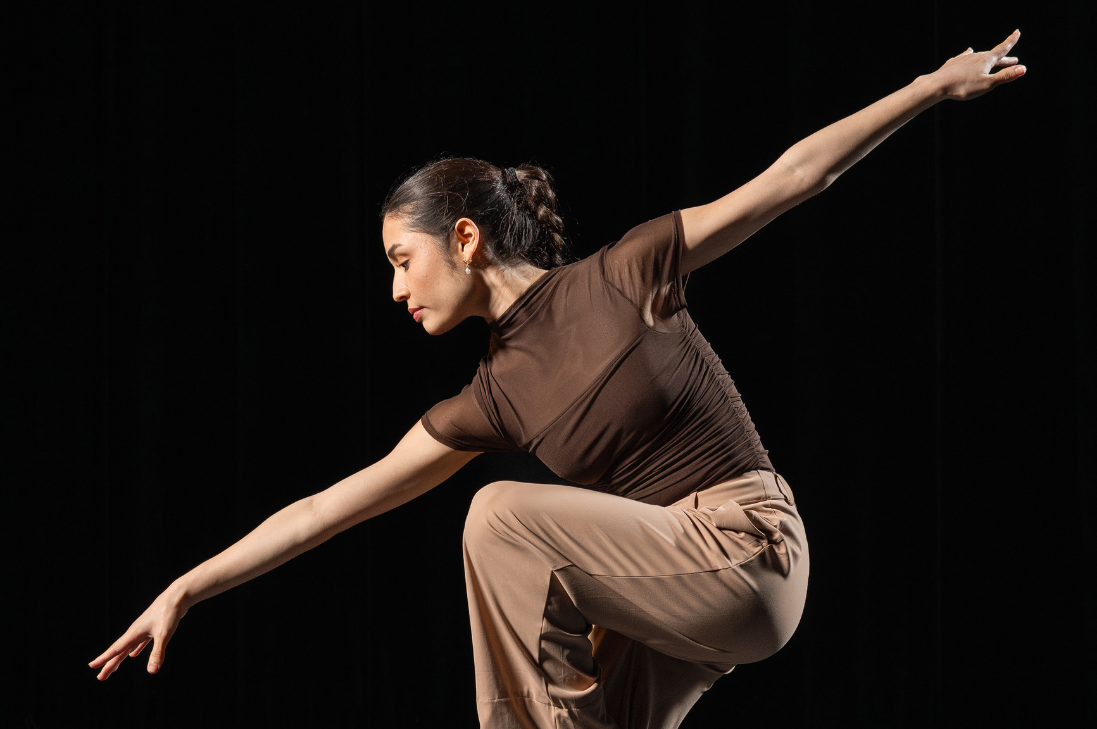 Dancers performing a ballet on stage