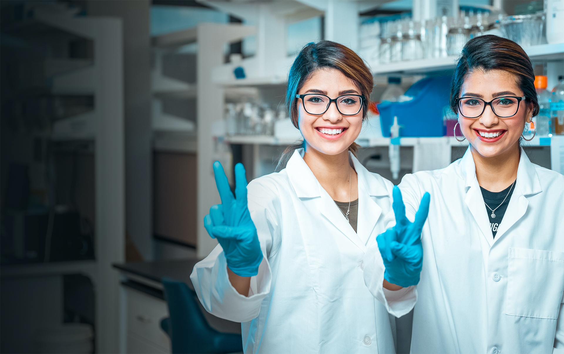 UTRGV students in different classrooms, each focused on diverse career fields such as engineering, theater, and medical studies.