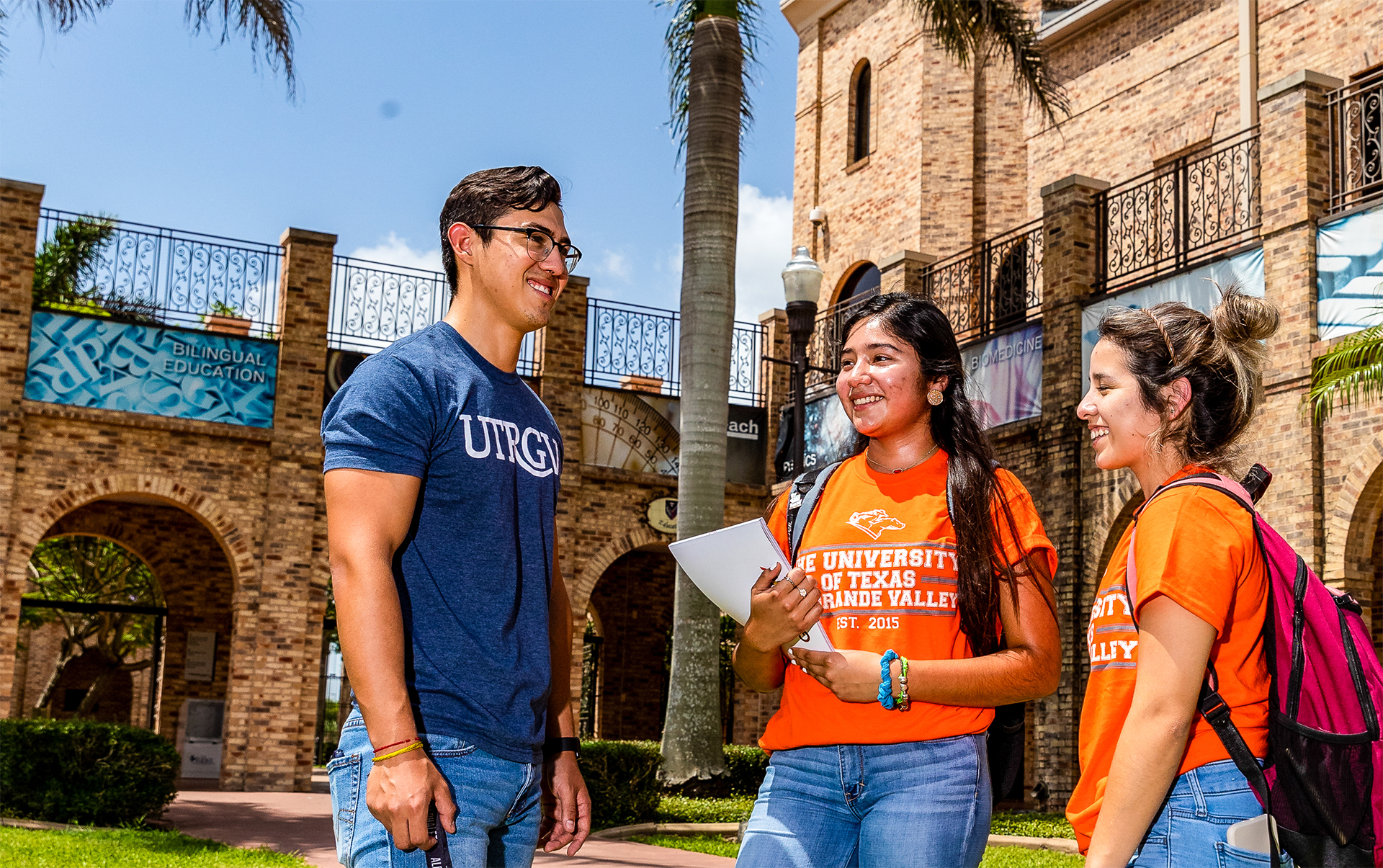 Students talking in front of UTRGV building 