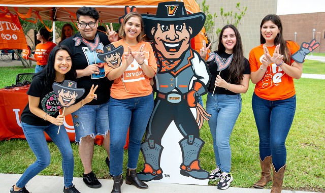 UTRGV creator of hand sign and other students