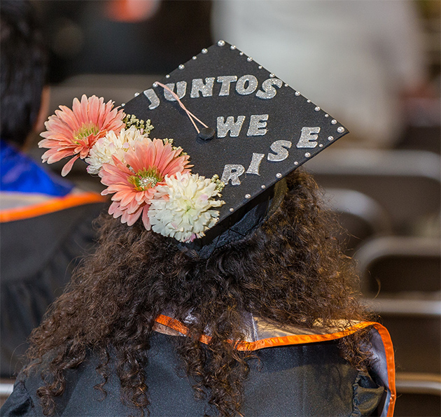 This decorated mortarboard, worn at the UTRGV Commencement ceremony on the Brownsville Campus on May 12, 2017, displays the pride of accomplishment UTRGV students are known for: “Juntos (together), we rise.” Now, Hispanic Outlook in Higher Education magazine has ranked UTRGV third in the country in awarding bachelor’s degrees to Hispanic students. (UTRGV Archive Photo by David Pike)