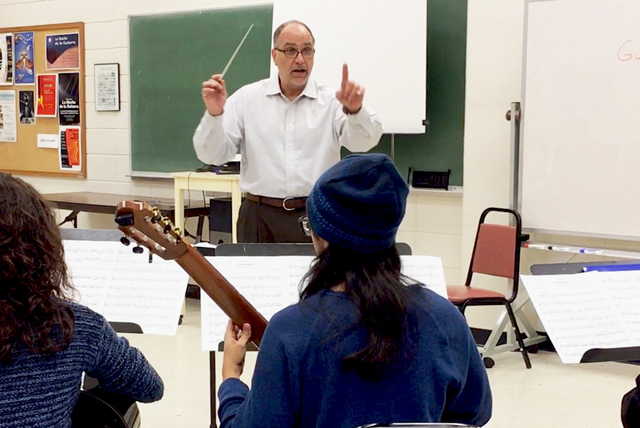 University of Texas Rio Grande Valley music professor Dr. Michael Quartz is shown here leading a guitar ensemble class at the UTRGV Brownsville Campus. The National Association for Music Education has selected him to lead the inaugural All-National Guitar Ensemble this year in November in Orlando, Florida. (UTRGV Photo by Maria Elena Hernandez)