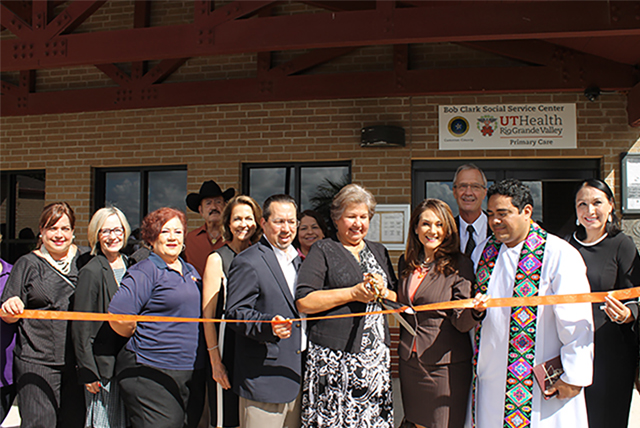 The UTRGV School of Medicine celebrated the grand opening of its second Area Health Education Center on Thursday, Oct. 4, in the Bob Clark Social Service Center in Cameron County. The School of Medicine received a five-year, $3.75 million grant from the U.S. Department of Health and Human Services’ Health Resources and Services Administration to develop the three AHECs, which will offer free healthcare to residents and educational opportunities for students enrolled in UTRGV’s health professions programs. Pictured from left are: UTRGV School of Medicine AHEC Manager Christie Cantu; UTRGV School of Medicine Senior Director of Clinical Operations Dr. Linda Nelson; Martha Cramer, director of Centro Cultural, Cameron County and AHEC at Bob Clark Community Advisory Board member; UTRGV Deputy President Dr. Janna Arney; Cameron County Judge Eddie Treviño; Cameron County Commissioner Sofia Benavides; UTRGV Vice President for Governmental and Community Relations Veronica Gonzales; UTRGV School of Medicine Senior Associate Dean for Community Health Partnerships and AHEC Program Director Dr. John Ronnau; Father Ricardo Chavez Flores, San Diego de Guadalupe Catholic Church, and Mary Esther Sorolo, Justice of the Peace, Cameron County. (Courtesy Photo)