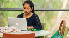 UTRGV student using a laptop computer