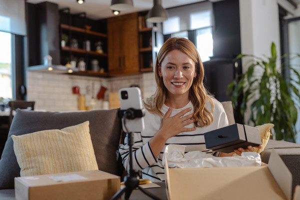 Woman making a short video using her smartphone