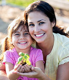 Social worker smiling with child