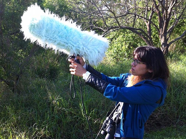 Student holding a microphone