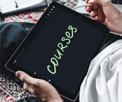 An ipad with the text courses written on it