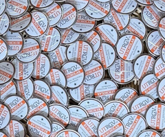 A pile of B3 scholar pins