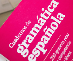 Pink book saying Cuadernos de Gramatica Espanola