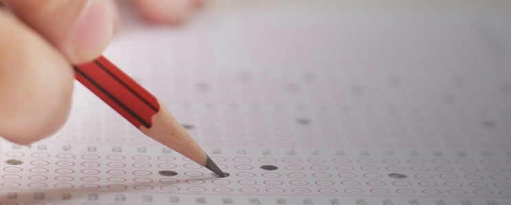 Student is filling out a bubble sheet