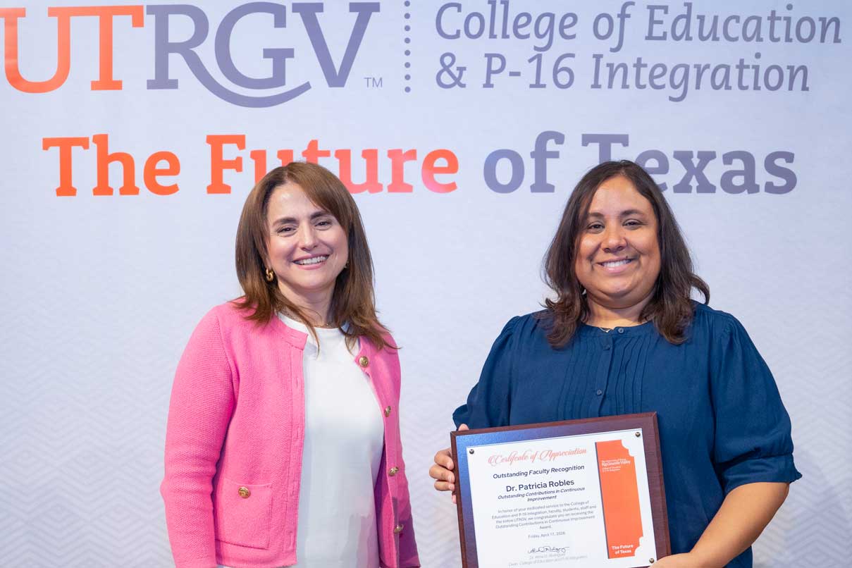 Ms. Patricia Robles receiving the Outstanding Faculty Contributions in Continuous Improvement Award