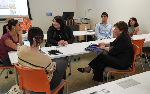 Program Coordinator Persephonie Martinez engaging with local RGV entrepreneurs.