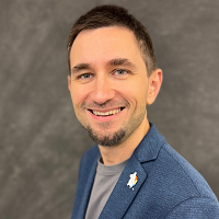 Smiling, faculty portrait.