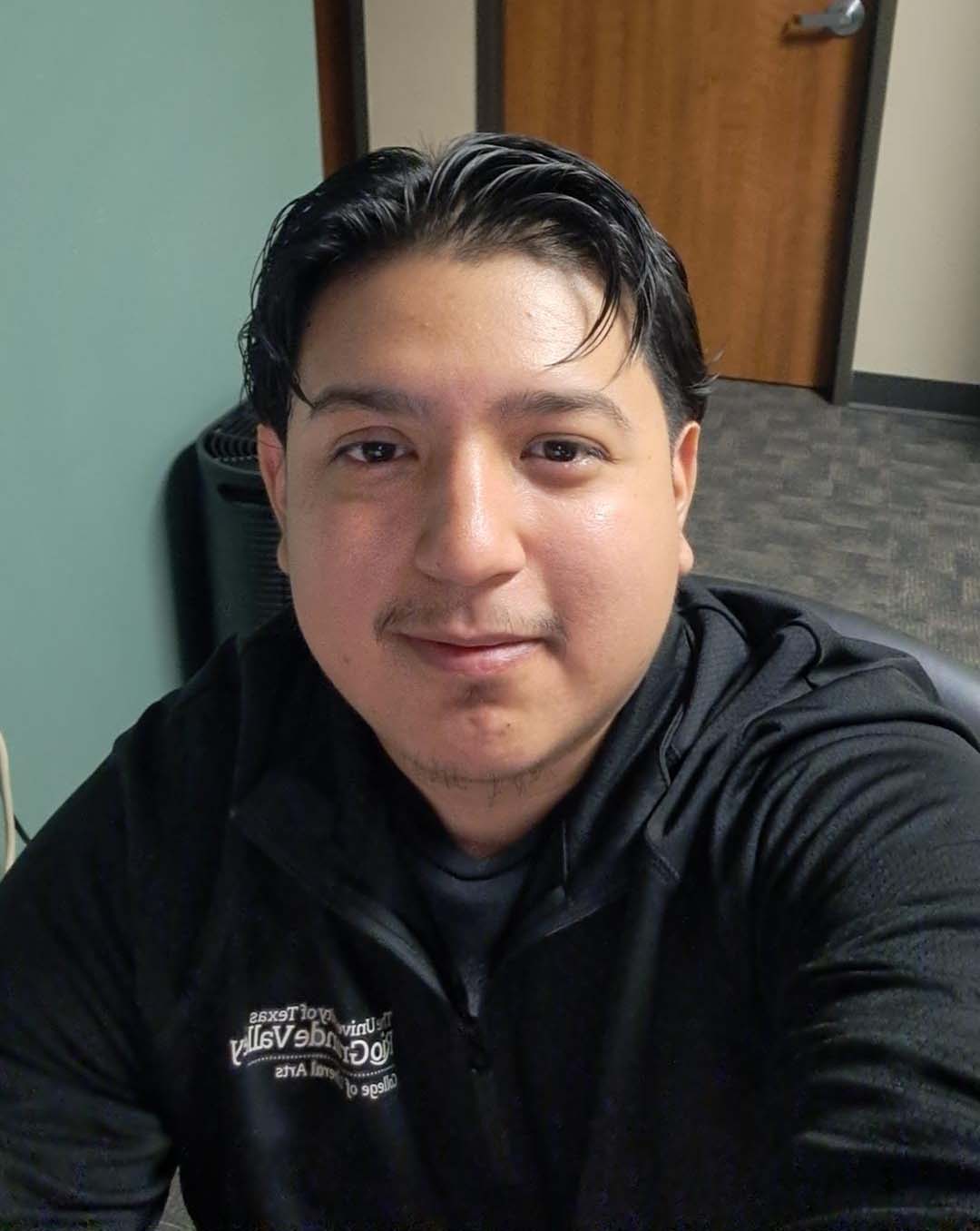 Smiling, staff portrait.