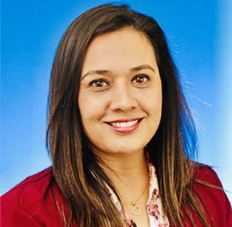 Smiling, faculty portrait.