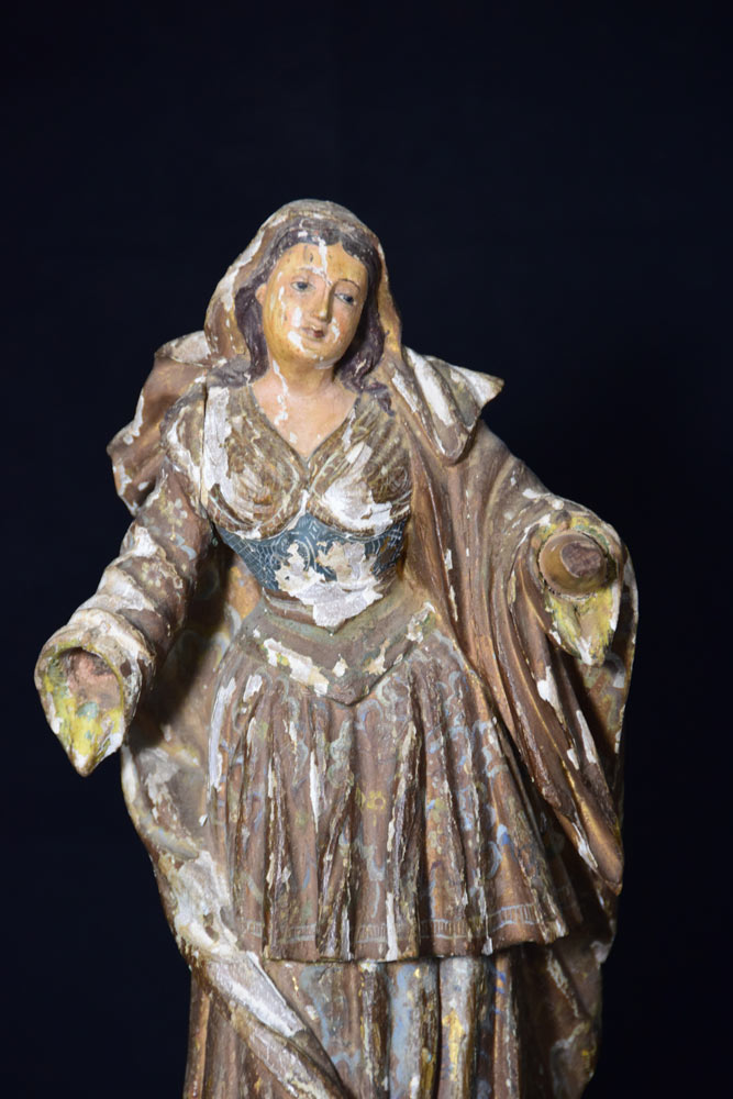 Anonymous Artist - Militant Female Santa - wood/paint carved figurine - Brazilian. Gift of Mary Hunter 2005.05.004 - Detail