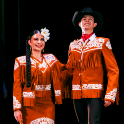 dancers wearing brown suits