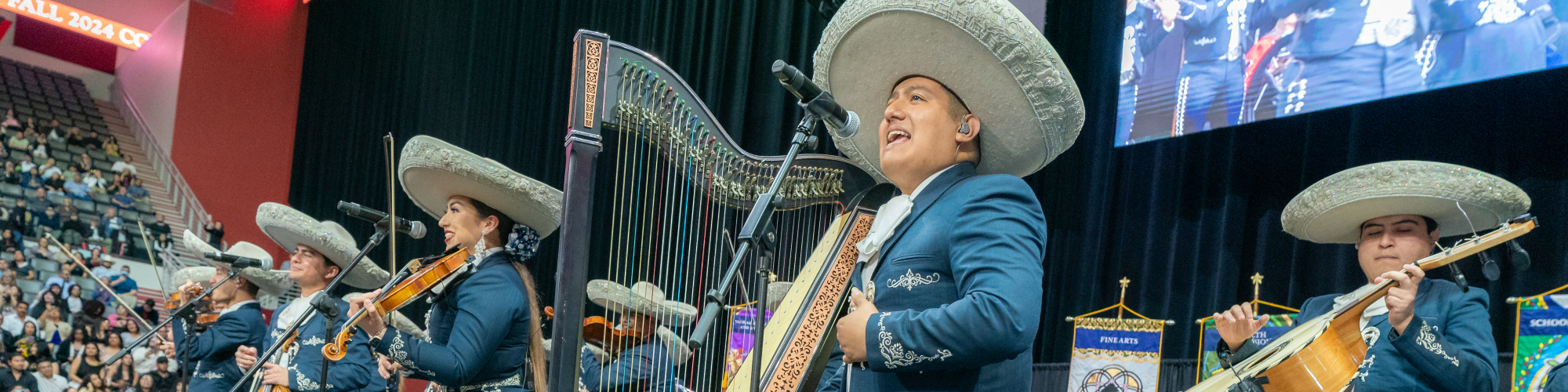 Students perform during commencement 