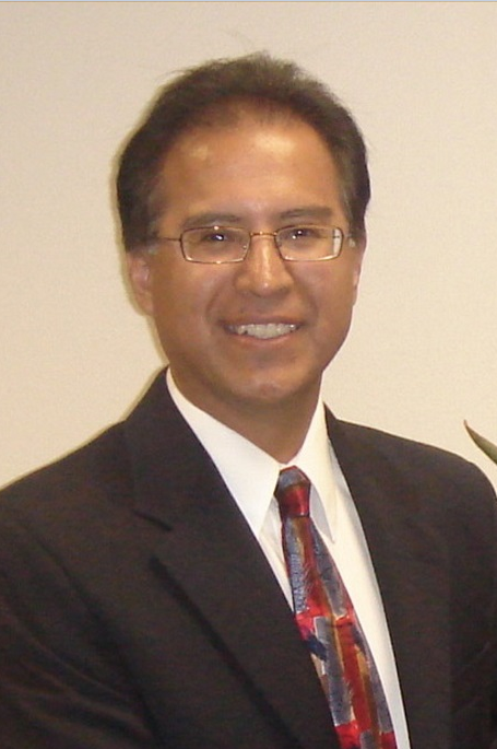 Smiling, faculty portrait.