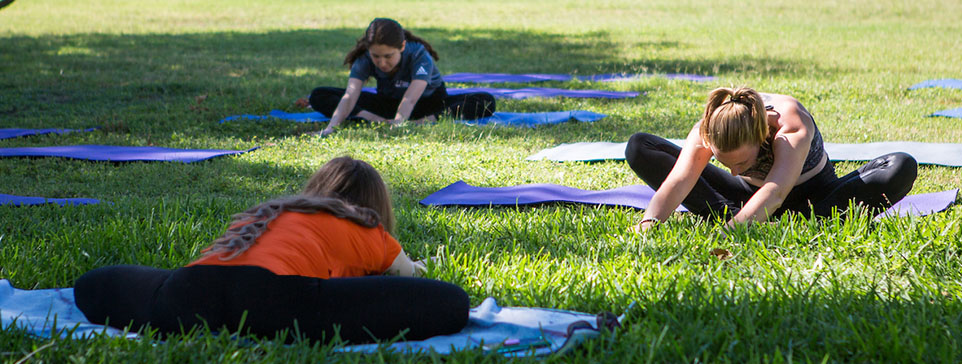 UTRGV students doing yoga.