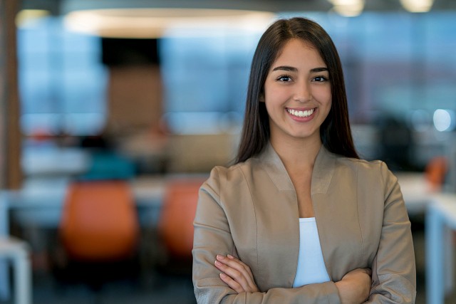 Female graduate student posing for photograph.