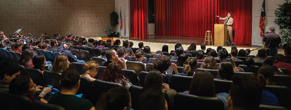 Presentation to group of people at the theater