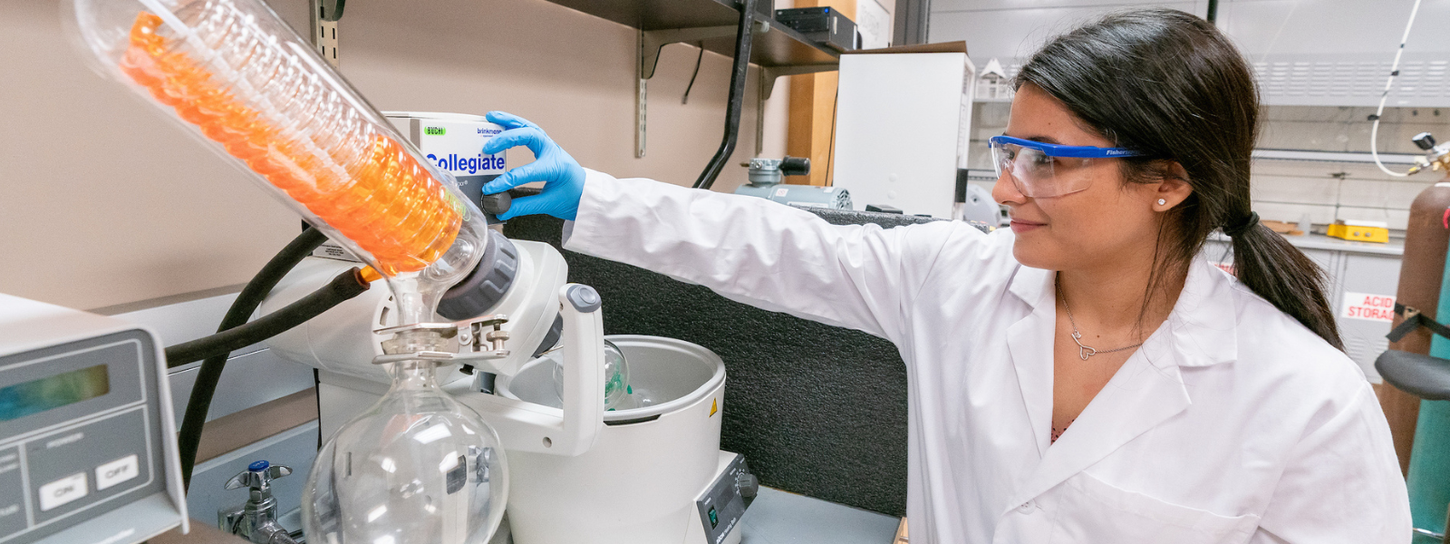 Lab student engaging with equipment