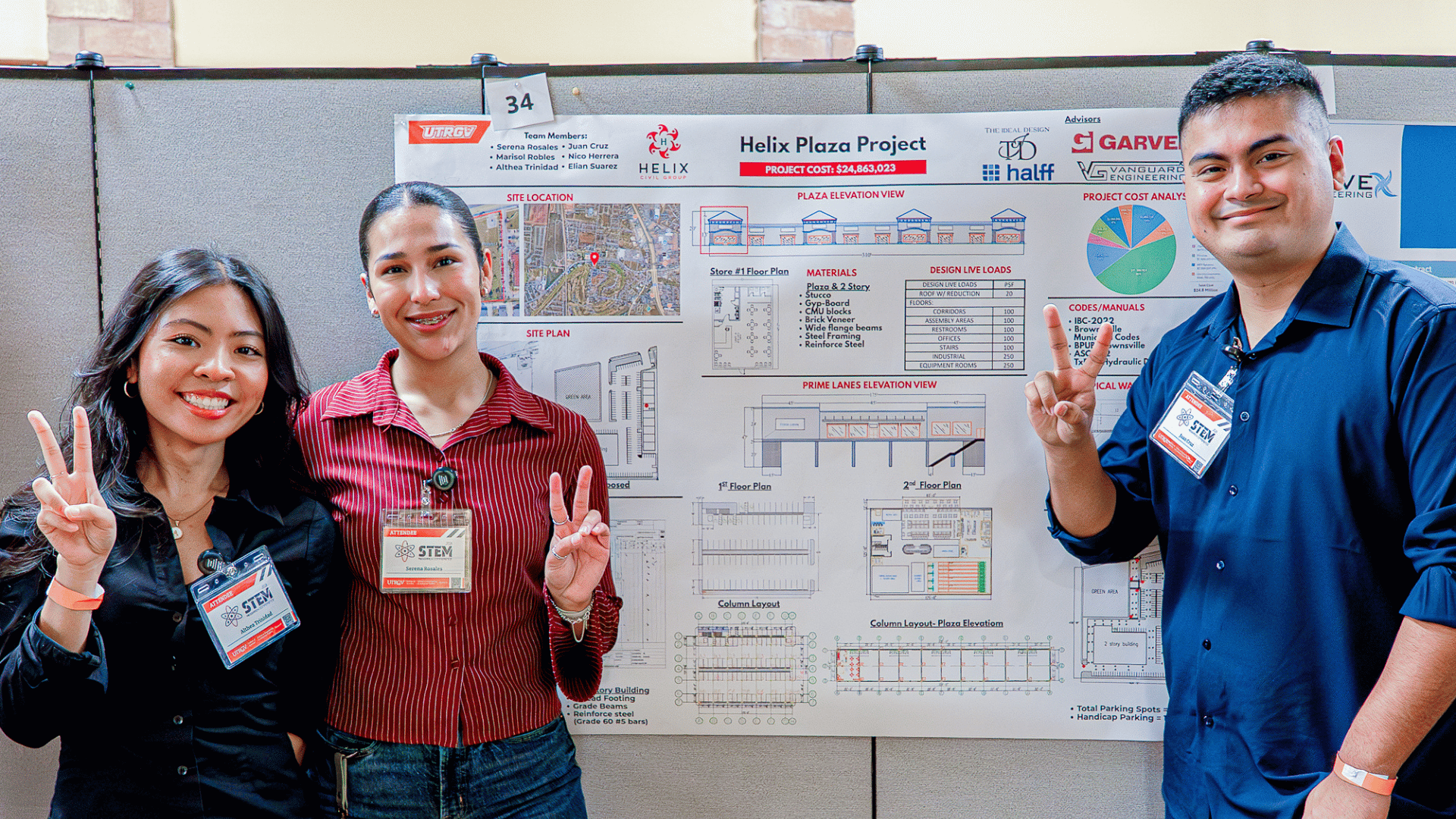 Three students posing for a photo in front of their research at the 2026 STEM Research Conference