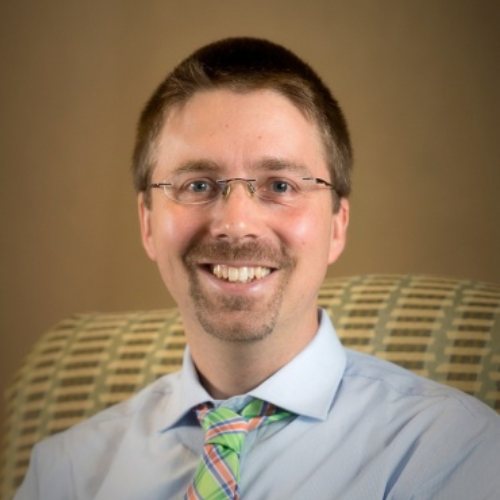 Headshot of Dr Timothy Huber