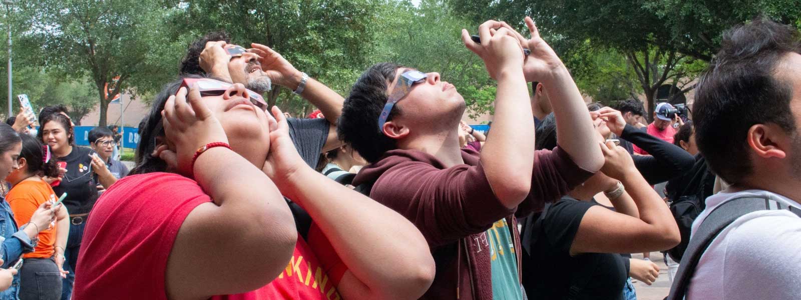 Students wear glasses to watch solar eclipse 