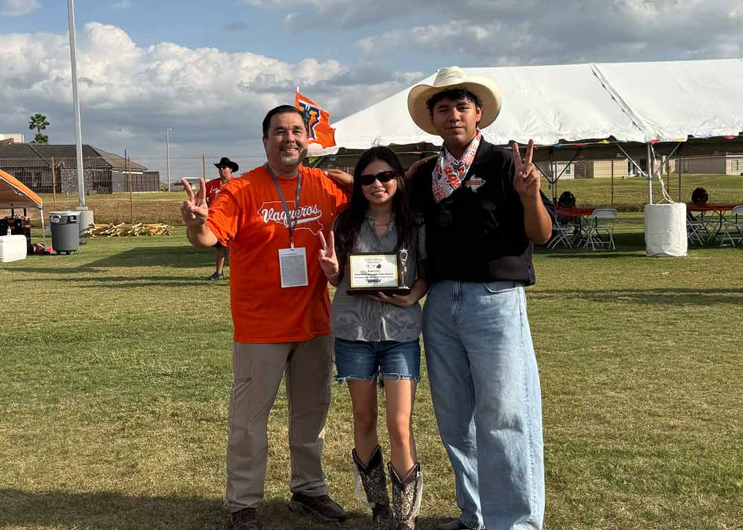 ENACTUS posing with their trophy