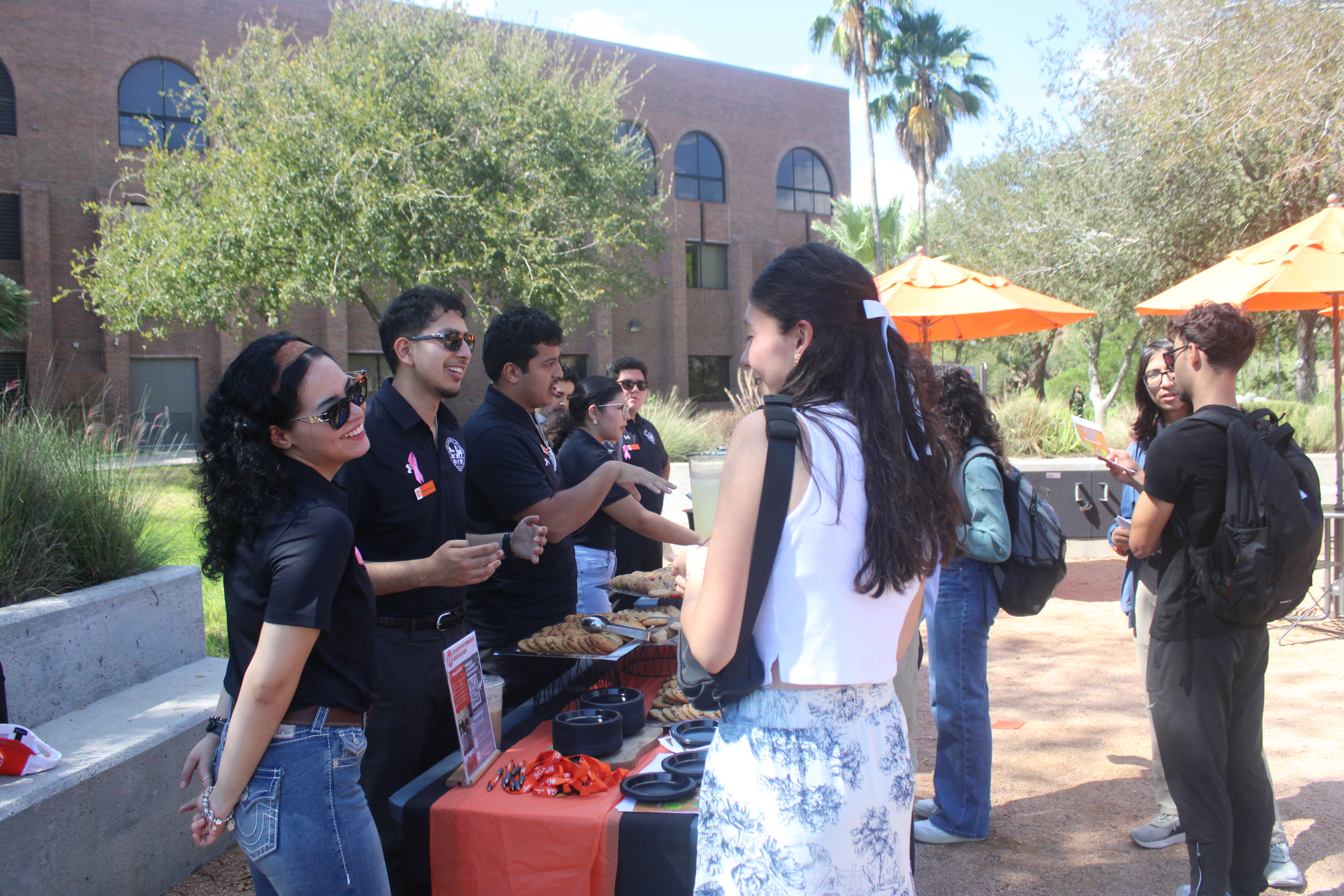 SGA members tabling outdoors.