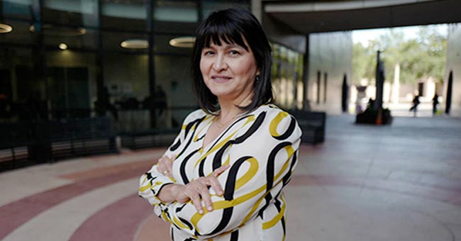 Dr. Cristina Villalobos, the director of the Center of Excellence in STEM Education, stands outside the science building on Thursday Sept., 14, 2023 in Edinburg, Texas