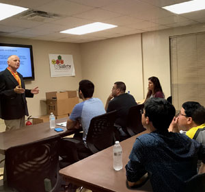 Engaged listeners lean forward with interest as safety director, Dr. Richard Costello, delivers one of his fascinating lectures.