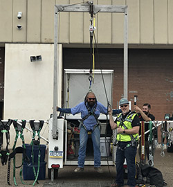 Two UTRG employees in training.