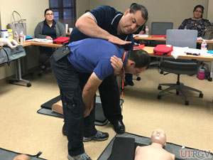 Mr. Daniel Ramirez demonstrates care for a conscious choking victim.