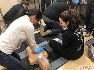 Performing chest compressions on an adult manikin, November 28, 2018.