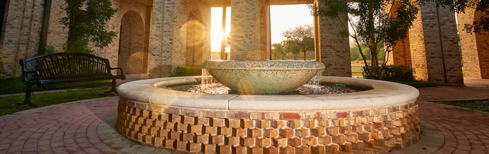 Sunset at fountain in Brownsville Campus.