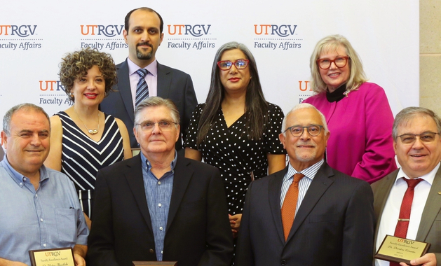 faculty excellence awards group photo of awardees with the provost and vice provost for faculty affairs during the 2025 ceremony